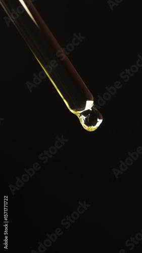 Macro Skincare Dropper with Oil on Black – Vertical Beauty Product Video