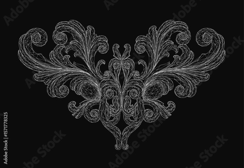 Intricate black and white floral design with detailed ornamentation stands out against a dark background. The decorative pattern features varied shapes and contrasting colors.