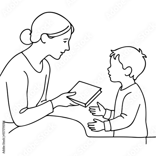 Mother handing a bedtime book to her child while sitting indoors  