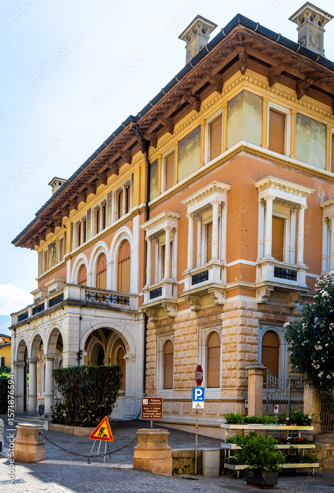 Fototapeta premium View of Gargnano signpost by Lake Garda, Italy; ideal for travel and destination visuals.
