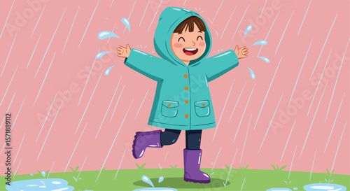 Happy Child Playing in the Rain with Raincoat and Boots