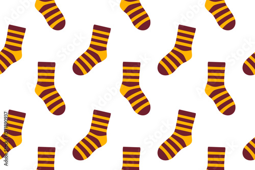 Seamless pattern with striped brown and orange socks. Warm color palette for autumn and cozy clothing themes.