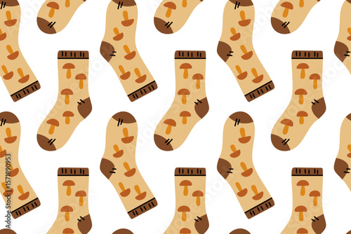 Seamless pattern with socks decorated with mushrooms. Autumn forest theme with warm tones and cozy texture.