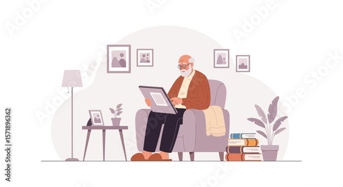 Senior Man Relaxing At Home Reading A Digital Tablet In Armchair