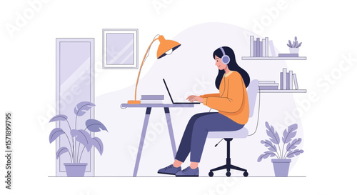 Woman Working From Home With Laptop And Headphones In Comfortable Space