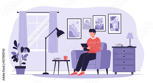 Young Man Enjoying Leisure Time With Tablet In Comfort Of Home Interior