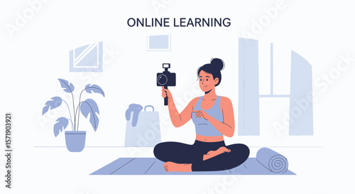 Young Woman Records Fitness Video While Meditating At Her Home Studio Setup