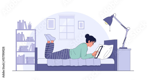 Young Woman Using Tablet While Lying On Bed In Bedroom At Home