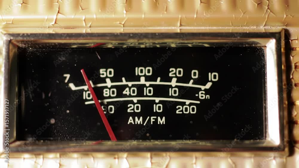 Vintage Radio Tuning Dial with Red Needle and Cracked Beige Casing Close Up Video