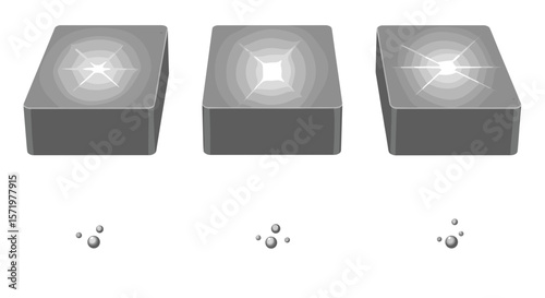 Three grayscale rectangular blocks with light reflections and small droplet clusters below them all in view