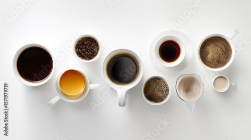 Assorted coffee drinks on white surface, showcasing rich flavors and artful presentation

