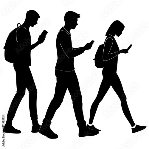 Silhouette of three teenagers walking using smartphones backpacks urban lifestyle
