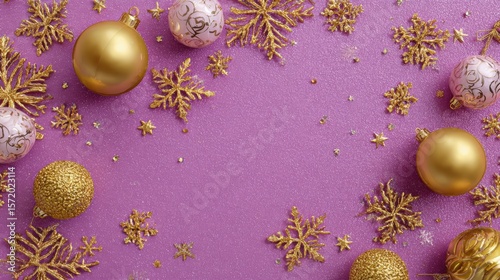 Golden and pink Christmas ornaments and snowflakes arranged on a sparkling pink background, creating a festive holiday atmosphere.