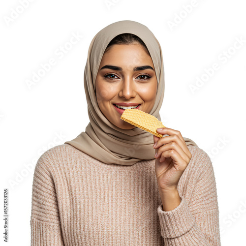 Smiling Woman in Hijab Eating Wafer Cookie