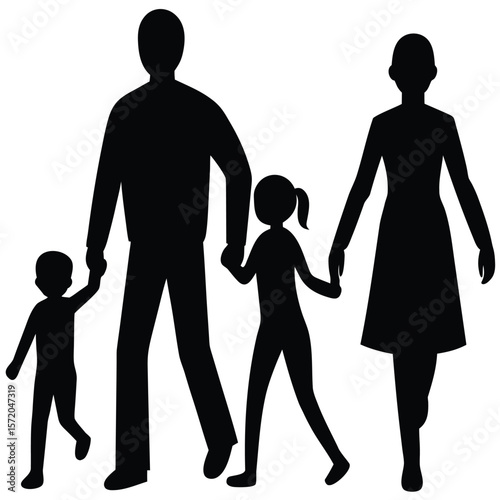 Silhouette of parents walking together holding hands with their young daughter and son
