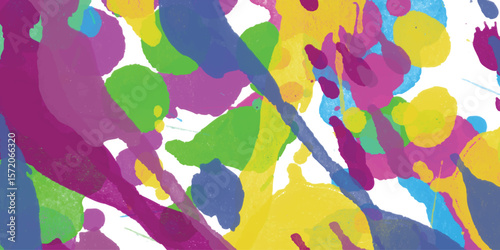 Artistic watercolor splashes in vibrant colors with abstract expressive splatters and drops over a white background for creative design