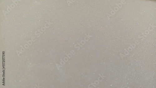 Subtle light gray textured background with soft variations, ideal for minimalist designs, abstract concepts, or as a clean copy space for websites and presentations.