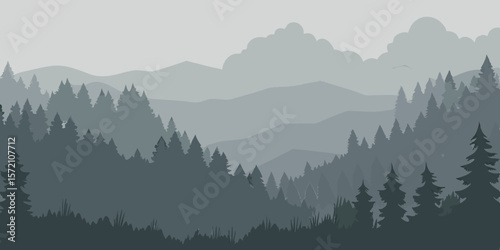 Foggy mountains at sunrise with cloudy valleys reveal a serene autumn landscape