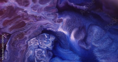 Glitter mix. Abstract art. Blur purple blue maroon color paint in ripple water acrylic wet texture flowing on creative background.