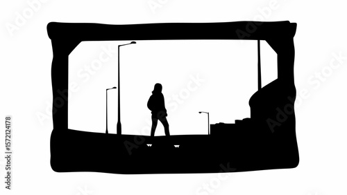 Silhouette of a person walking on a bridge with streetlights and cityscape in the background view framed