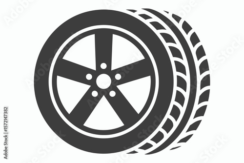 Stylized dark gray car tire and wheel icon on white background