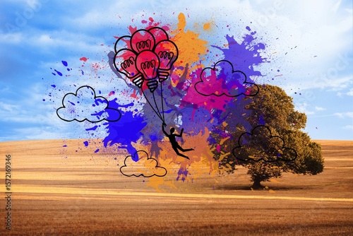 Light bulb balloons on splashes over countryside