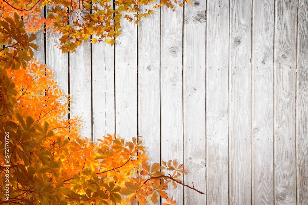 Naklejka premium Autumn leaves and branches are reaching into frame in flat design wooden plank fence backdrop