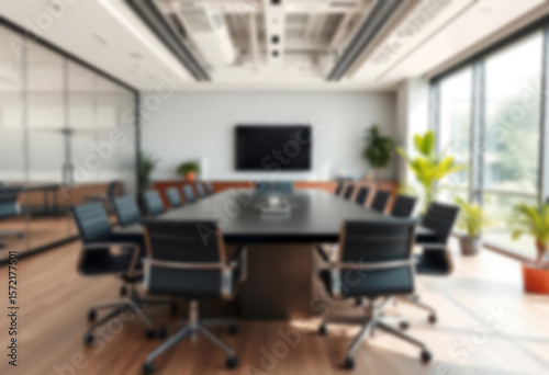 blurry office, interior of a modern office with a large meeting table, green theme, small plants in the corners of the room, office wallpaper.