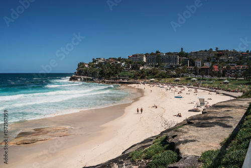 Fototapeta Naklejka Na Ścianę i Meble -  Sydney, Australia - January 2025 : Busy Bronte beach during a summer day