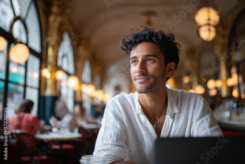 young handsome man working on laptop