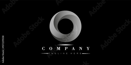 circle metal metallic silver logo on a black blackground
