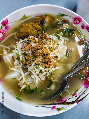 One bowl of very delicious chicken soto.
