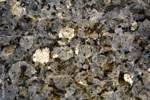 Background of polished black granite slab