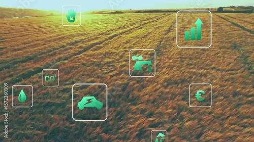Drone gliding across wheat field initiating fading icons for water CO? illustrating resource trends