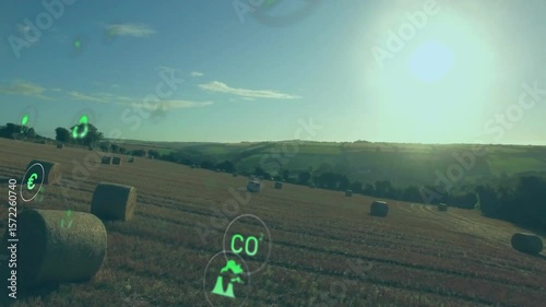Opening drone sweeping rightward over wheat field fading green icons showing sustainability metrics