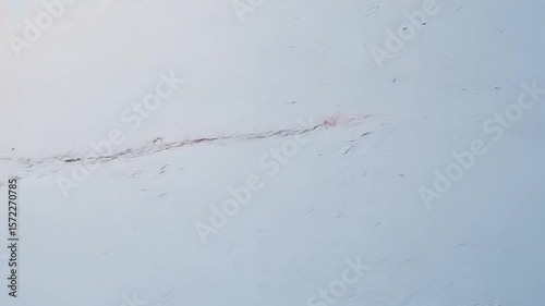 Smooth white stone texture abstract background with natural subtle vein patterns and copy space