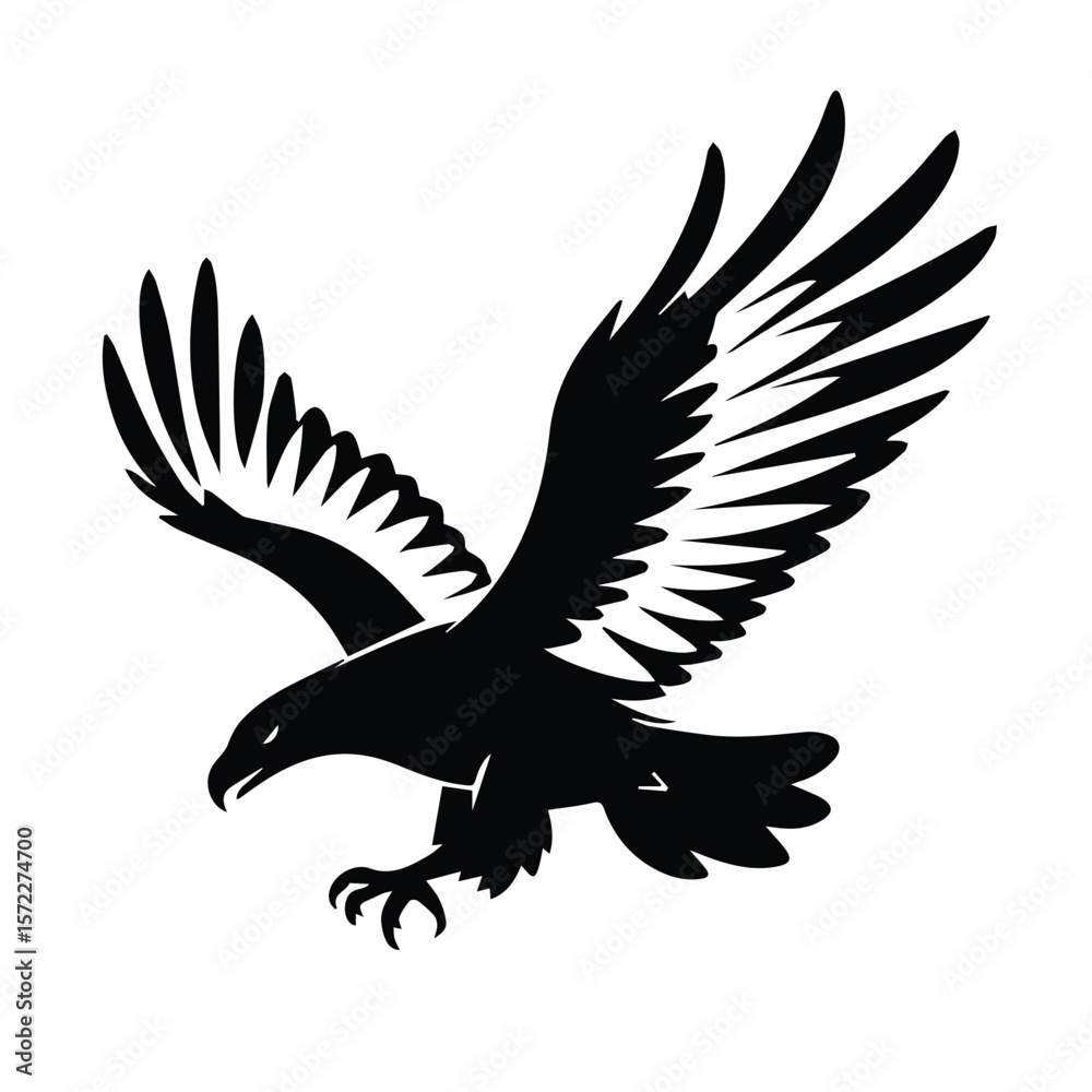Fototapeta premium Black and white silhouette of a soaring eagle in flight. Powerful airborne predator in a bold, graphic style. Wildlife graphic design element for diverse uses -