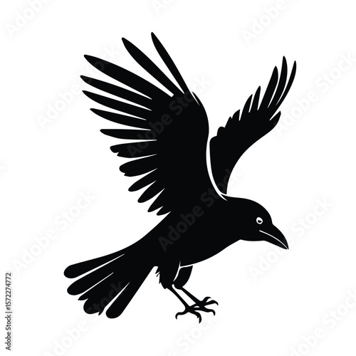 Black silhouette of a crow in flight against a plain white background. Crow in mid-air with outstretched wings. Bird in flight. Nature/wildlife. No specific location.