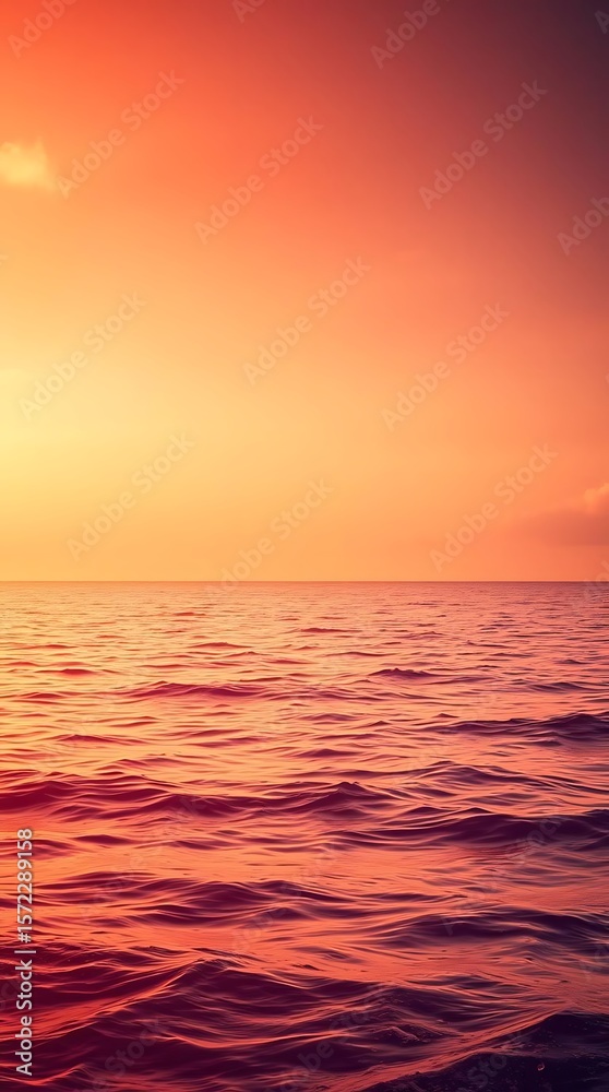 Fototapeta premium Serene ocean view at sunset with warm and soft light reflections