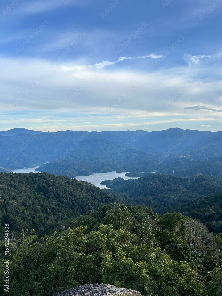 Naklejka premium mountain landscape with clouds