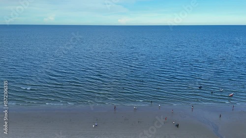 Scenic city coastline and tropical beach from above