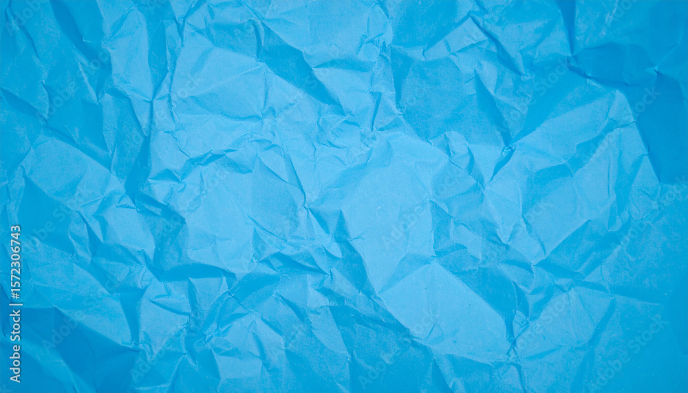 Obraz premium Crumpled blue paper texture background 