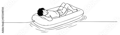 man relaxing on inflatable mattress in water