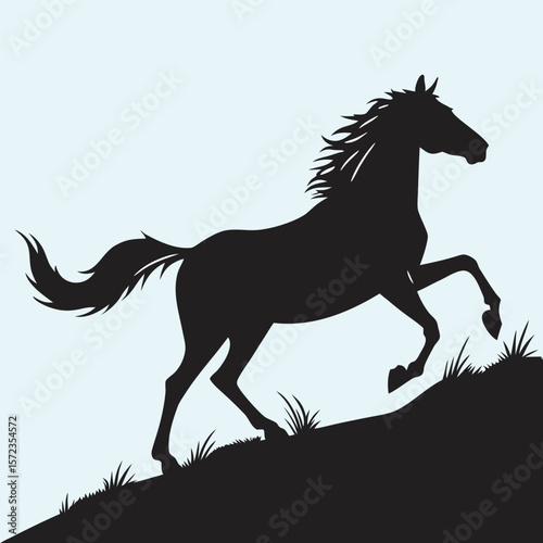 Majestic Silhouette of a Horse Galloping Up a Grassy Hillock