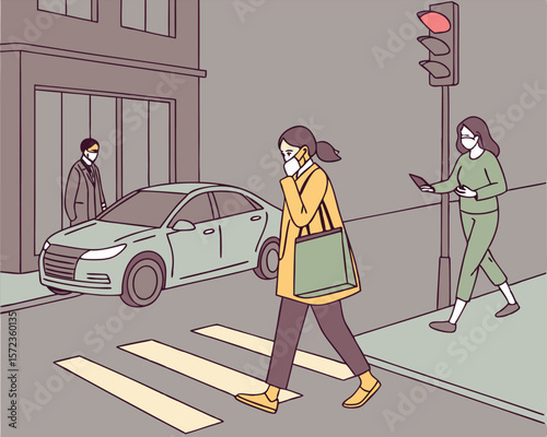 People wearing face masks crossing street during pandemic with car and traffic light