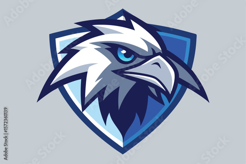 Fierce eagle with intense blue eyes is encased by a sturdy shield framework