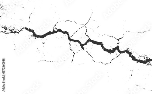 Jagged dark fissure across white textured surface with scattered debris crack fracture
