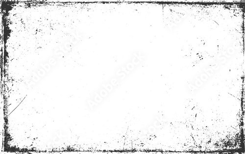 Grungy distressed black and white textured border with scattered speckles and scratches grunge