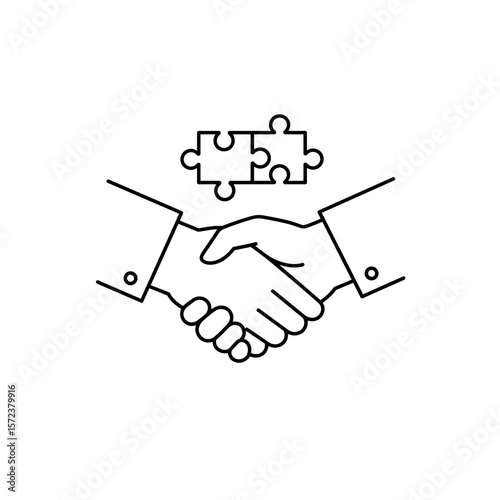 Hands shaking with puzzle pieces symbolizing partnership agreement  