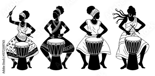 four african women playing djembe drums